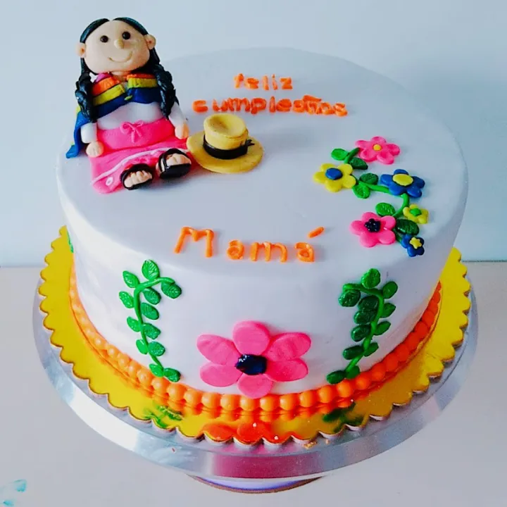 Tortita andina en masa elástica ,con muñequita modelada